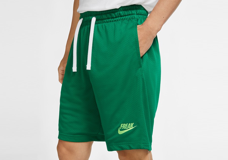 green nike shorts